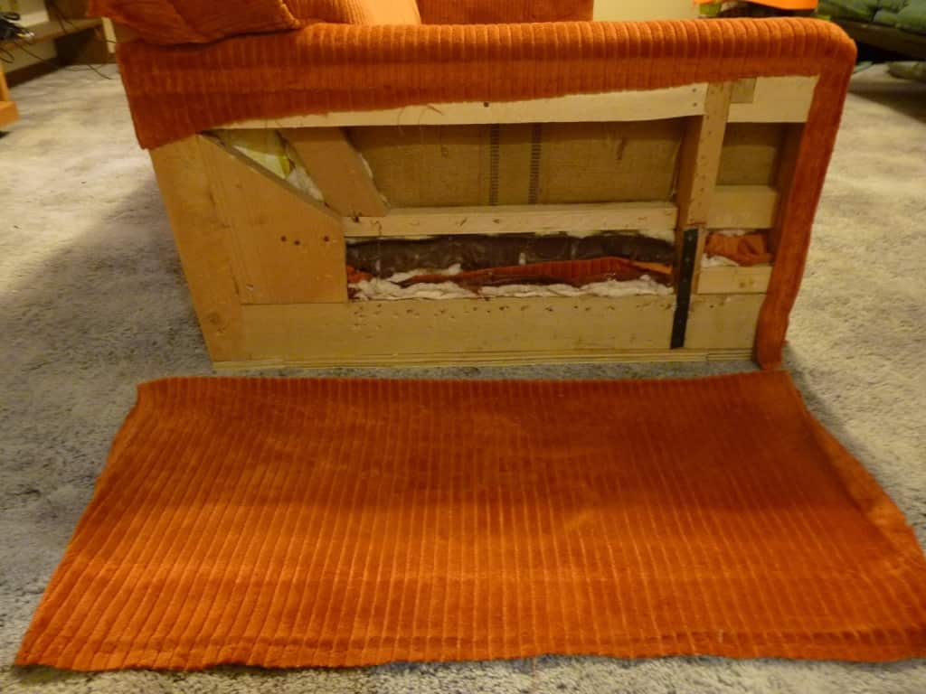 retirado de tela posterior de sillón para tapizar