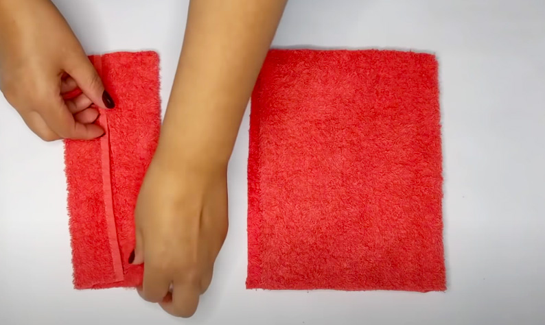primer doblez de tela para agarradera de esponja de limpieza
