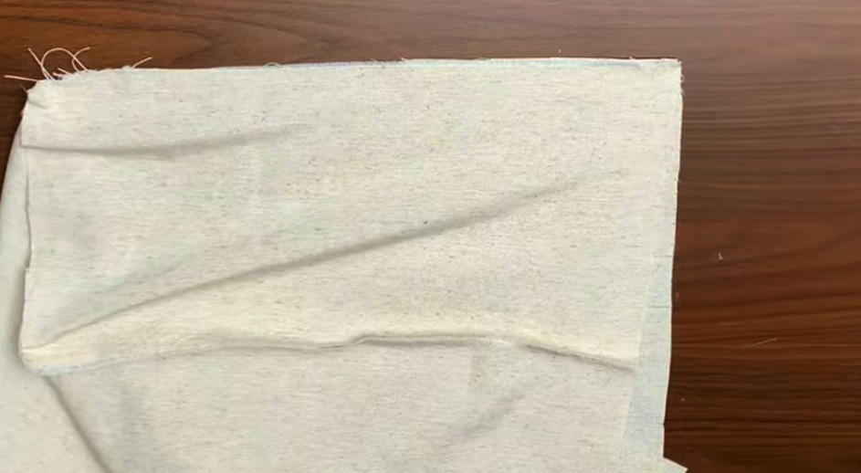 primera unión de rectángulos de tela para bolsa de plástico convertida en cartera